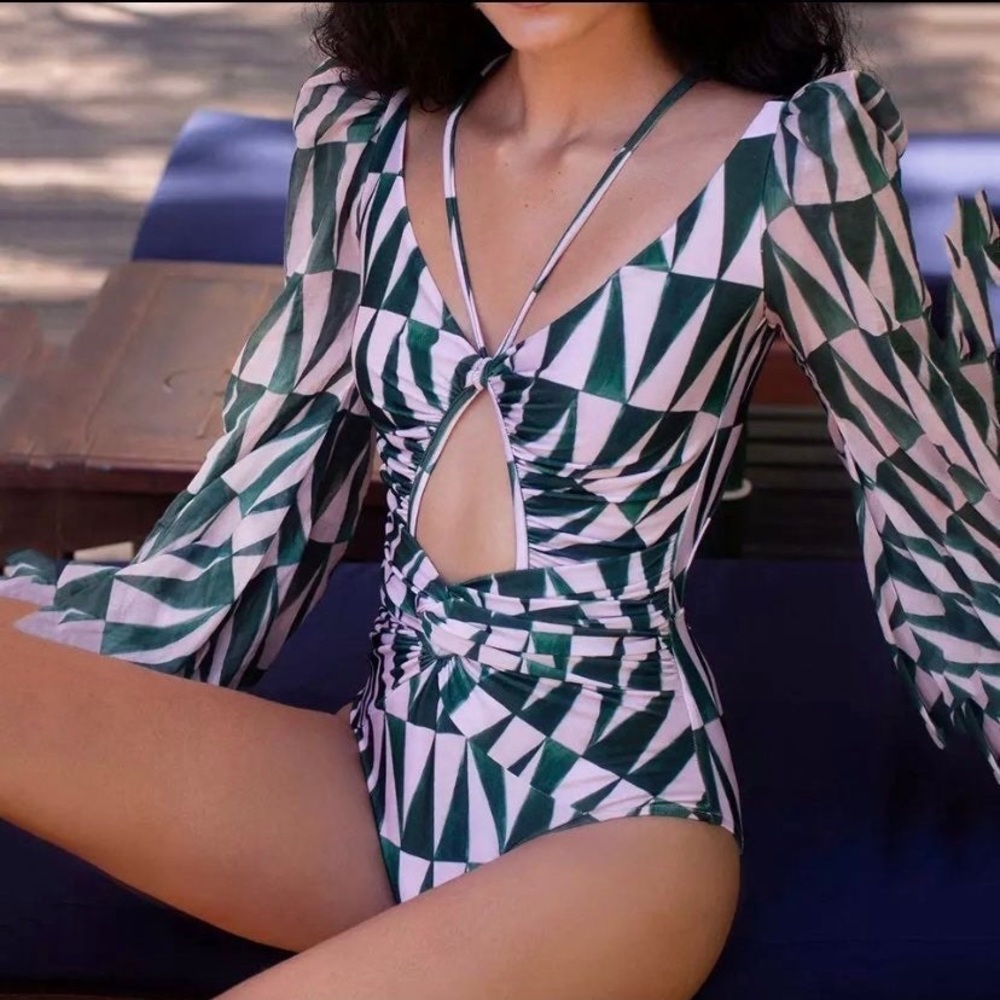 Gorgeous geometric print long sleeved swim suit.